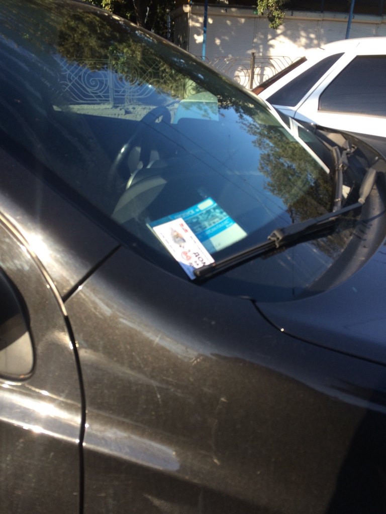 Заказчик - ТЦ "Орегон" (строительный гипермаркет) - распространение визиток по машинам на парковках